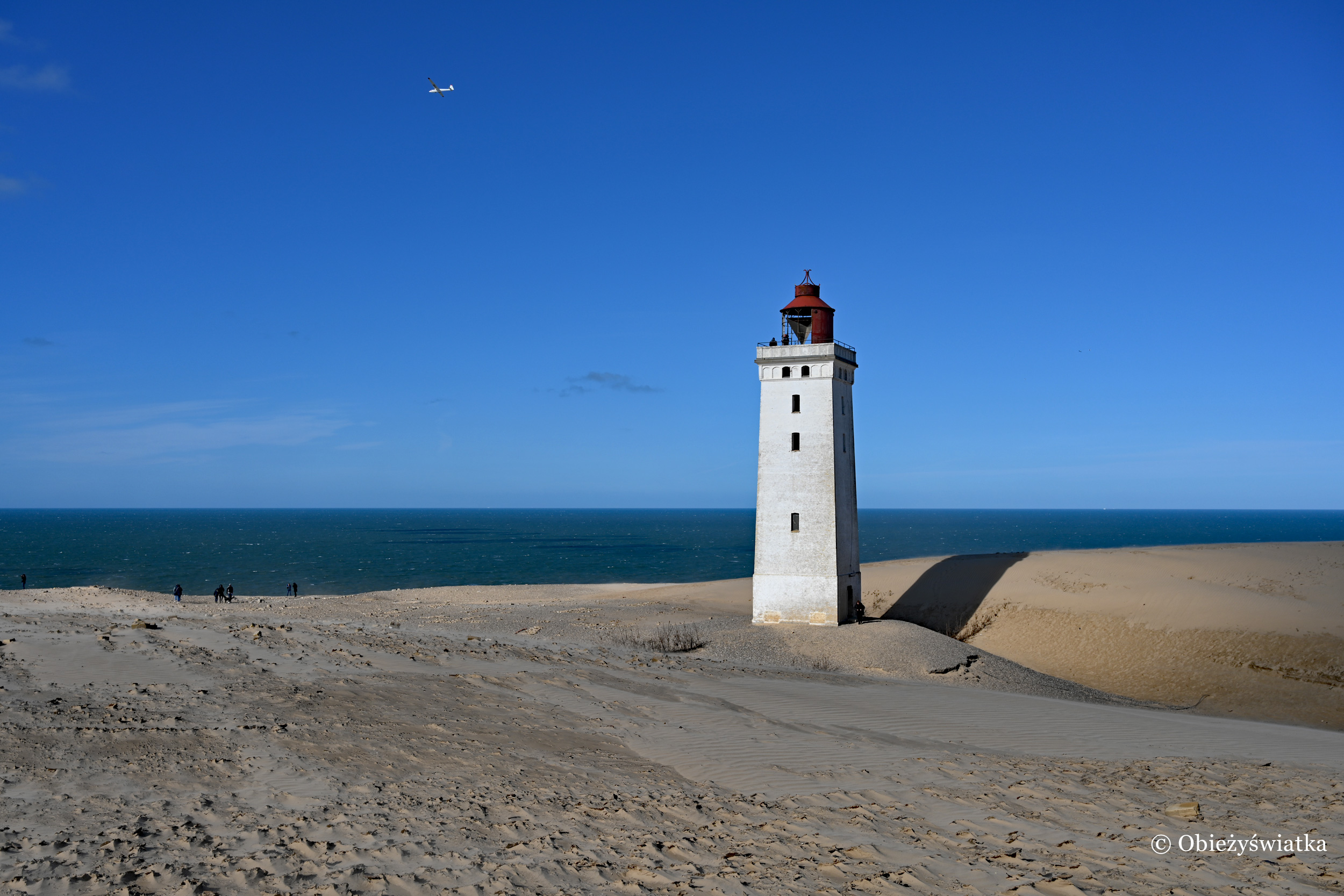 Ciemne morze, błękitne niebo, wydmy i biała latarnia...., Rubjerg Knude, Dania